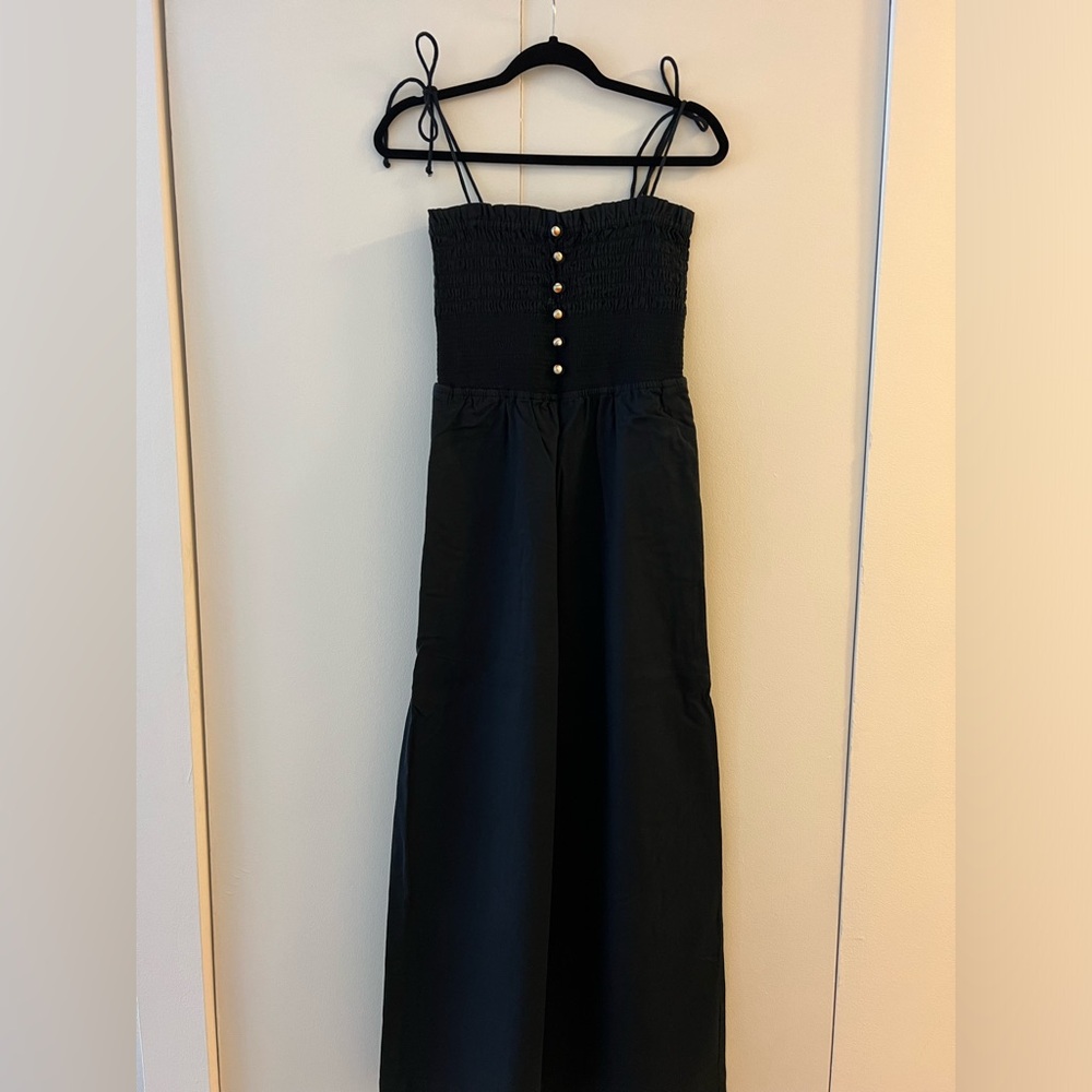 Black jumpsuit size small. Never worn.